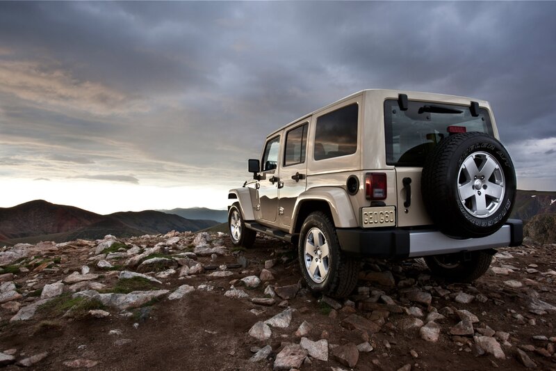 Beige Jeep Wrangler — Dramatic, Sunset