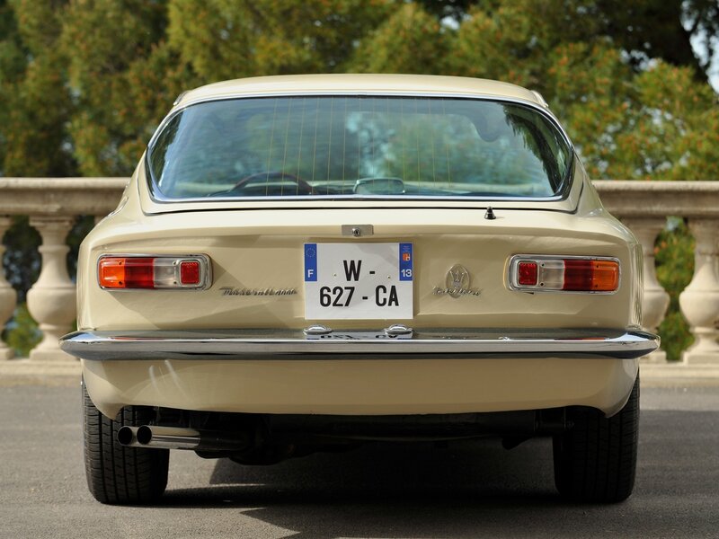 Beige Maserati Ghibli rear view