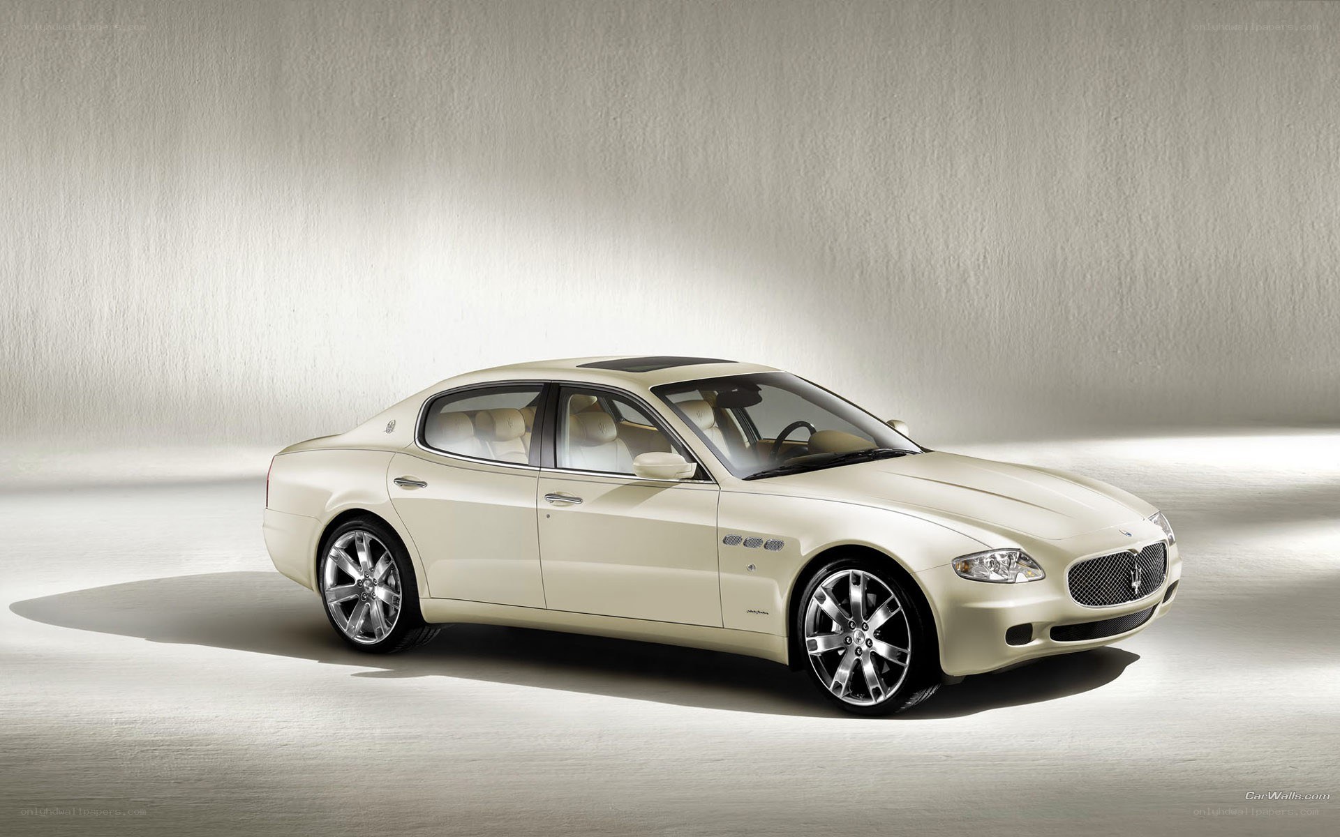 beige maserati sedan