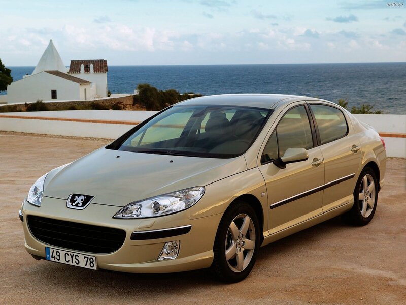 Beige Peugeot Sedan