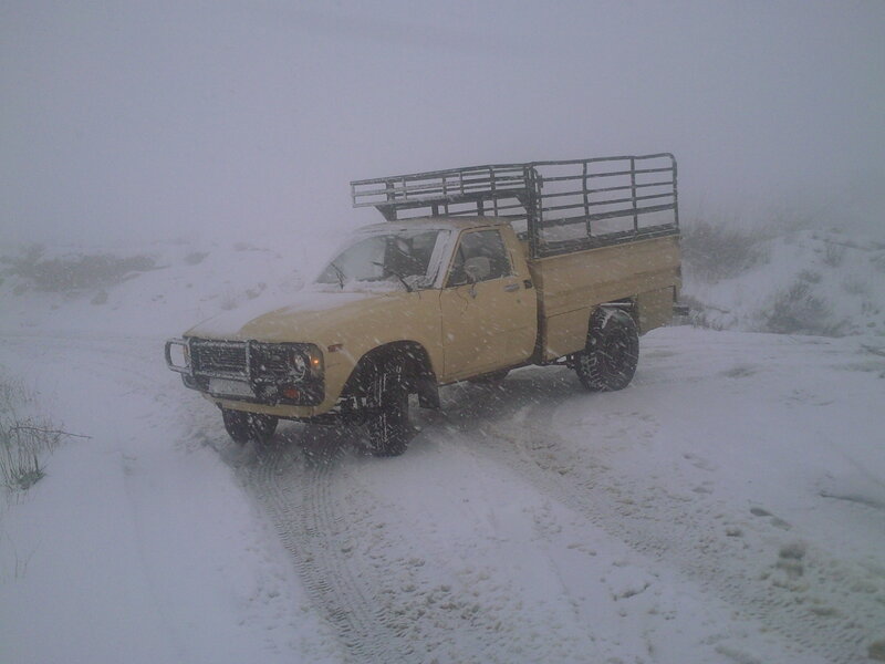 Beige Pickup Truck — White