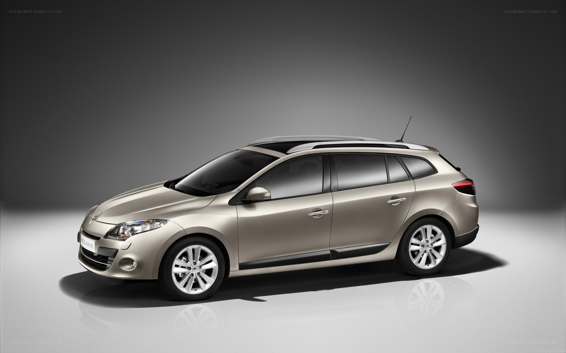 beige renault megane station wagon