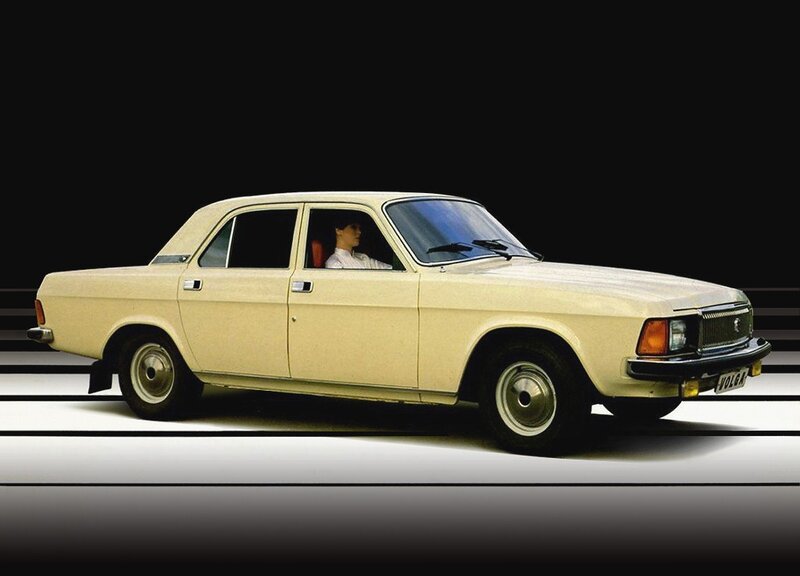 Beige sedan car in studio