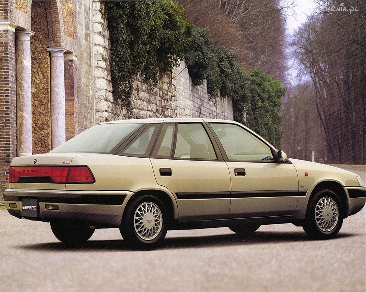 Beige sedan car parked