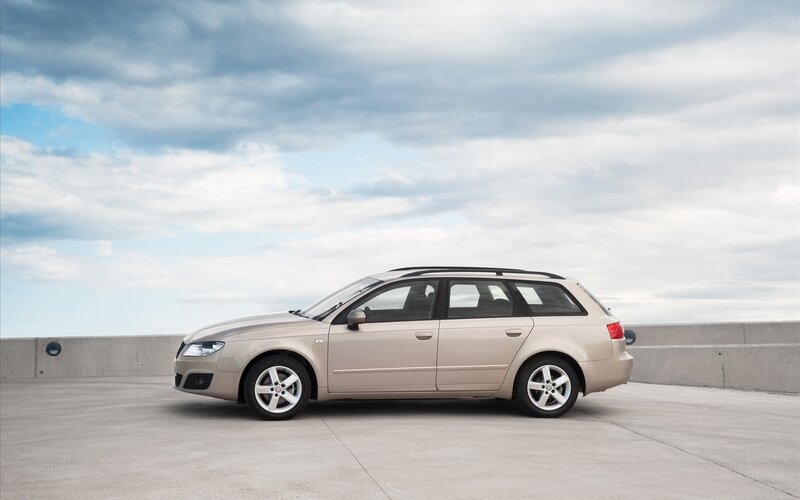 beige station wagon on concrete
