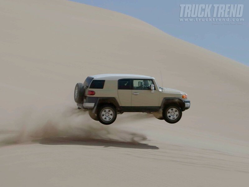 Beige Suv in Sand Dune