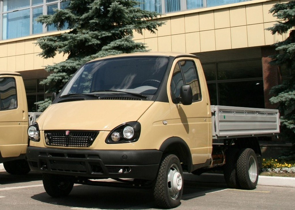 Beige utility truck parked