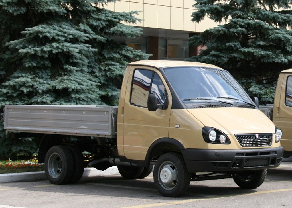 Beige utility truck with flatbed