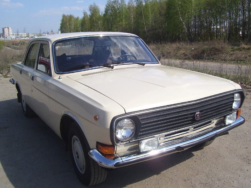 beige vintage sedan car