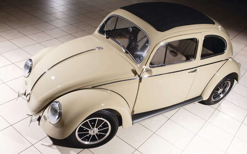 Beige Volkswagen Beetle with black roof