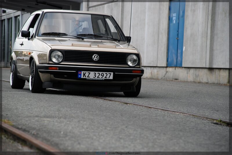 Beige Volkswagen Golf on a street