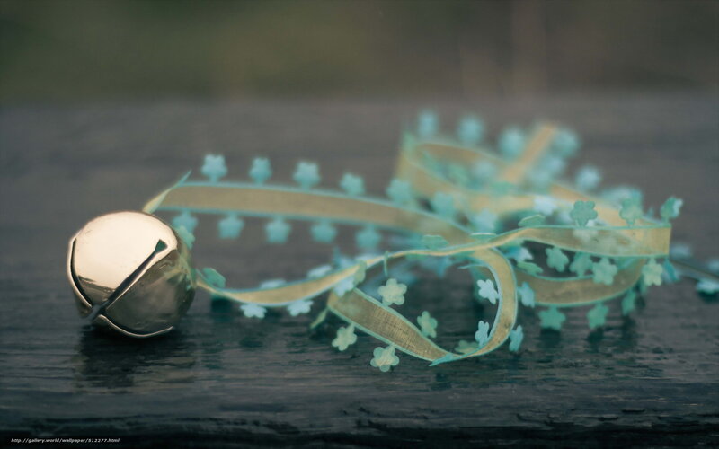 bell and ribbon on wood