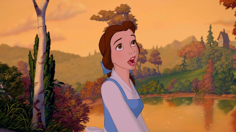 Belle by a pond at sunset