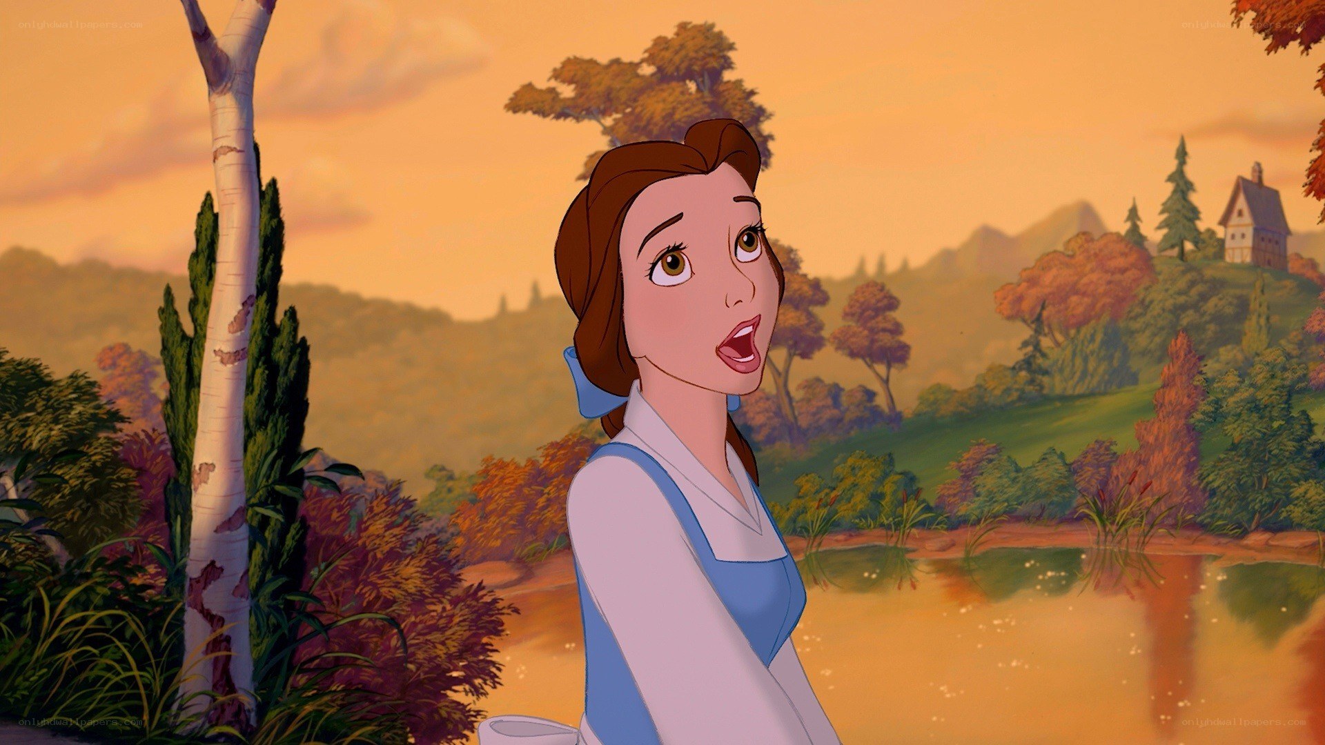 Belle by a pond at sunset