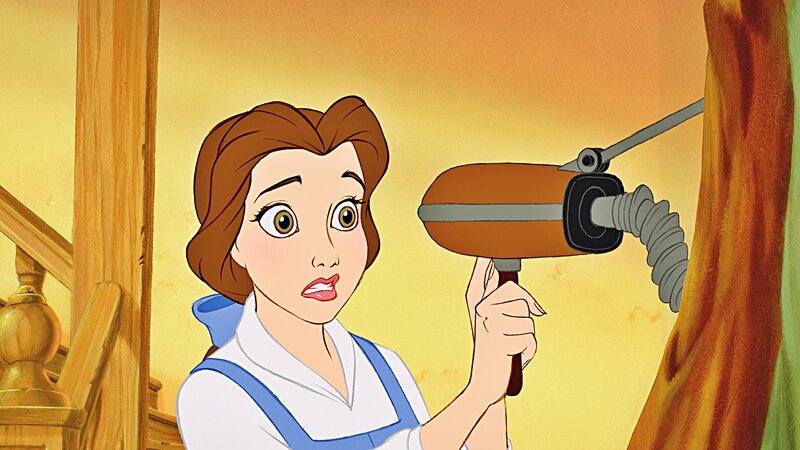 Belle Holding a Vacuum