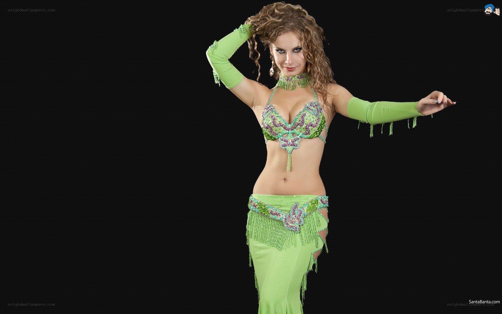 Belly dancer in green costume
