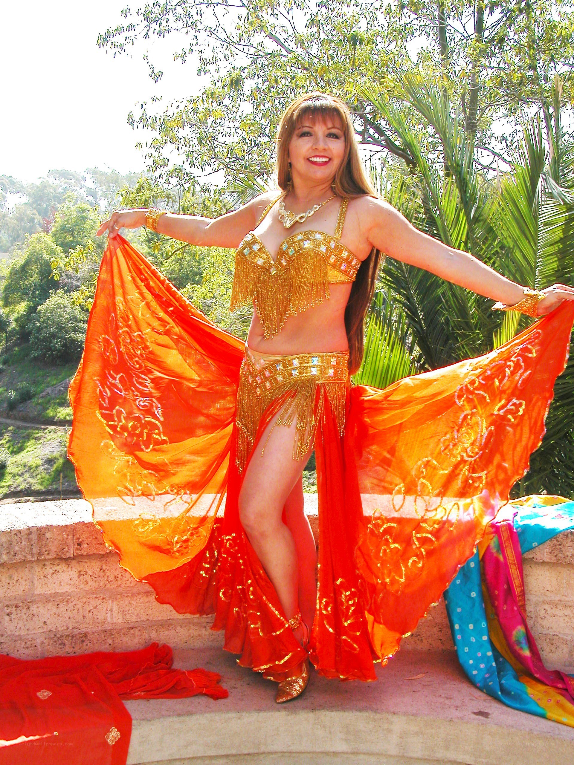 Belly dancer in orange costume