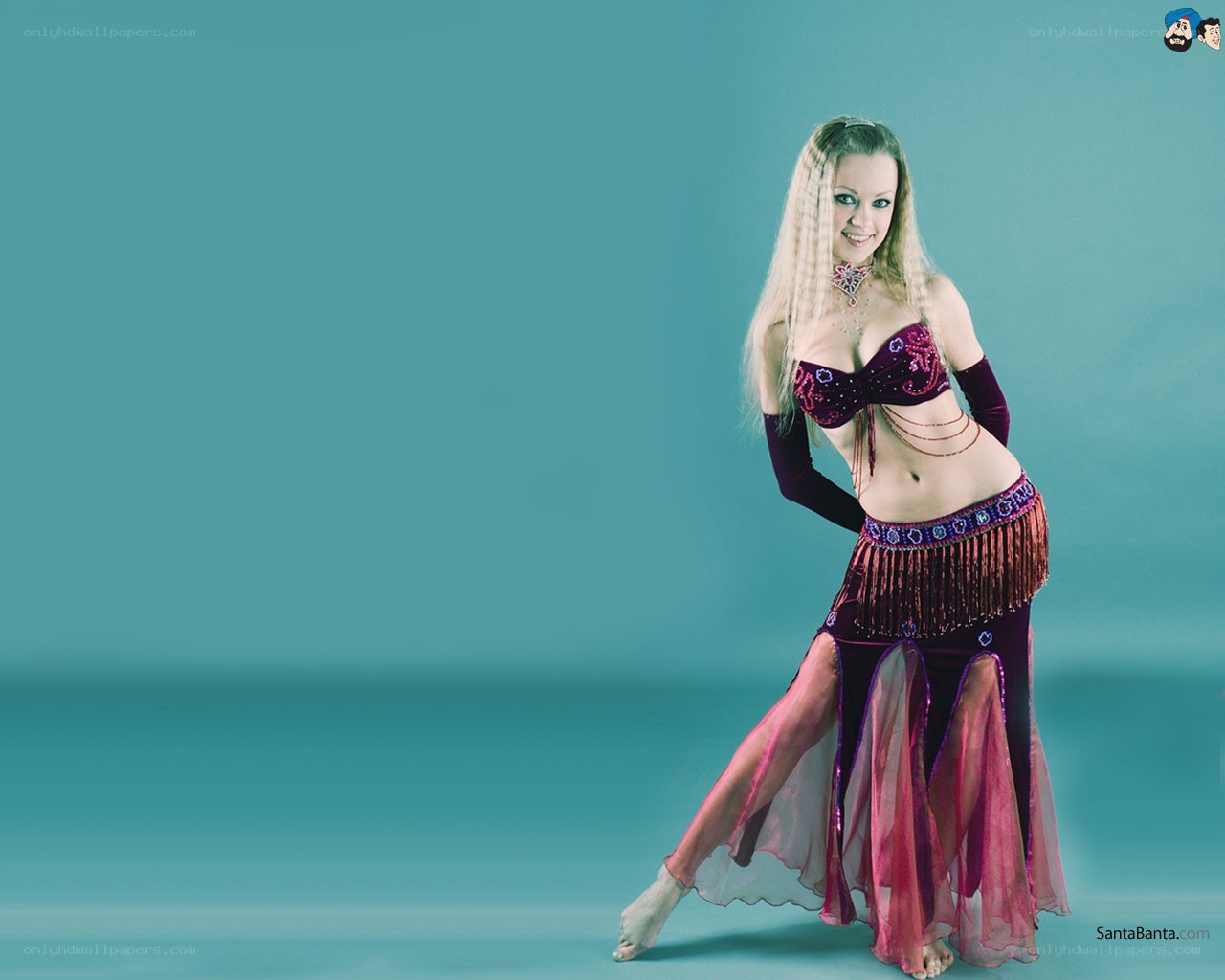 Belly dancer in purple costume
