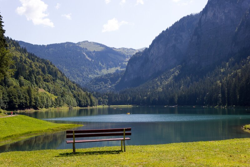 Bench by a mountain lake