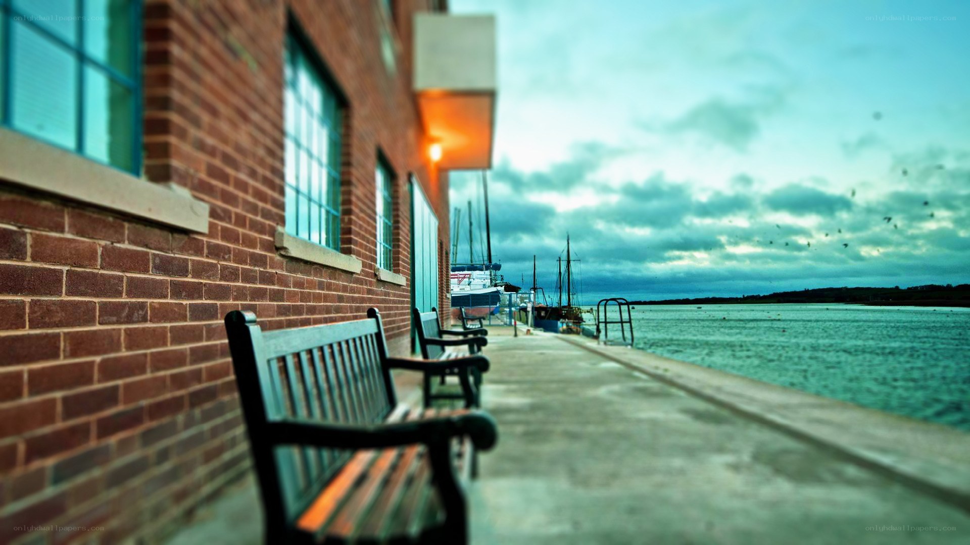 Bench by the harbor at dusk
