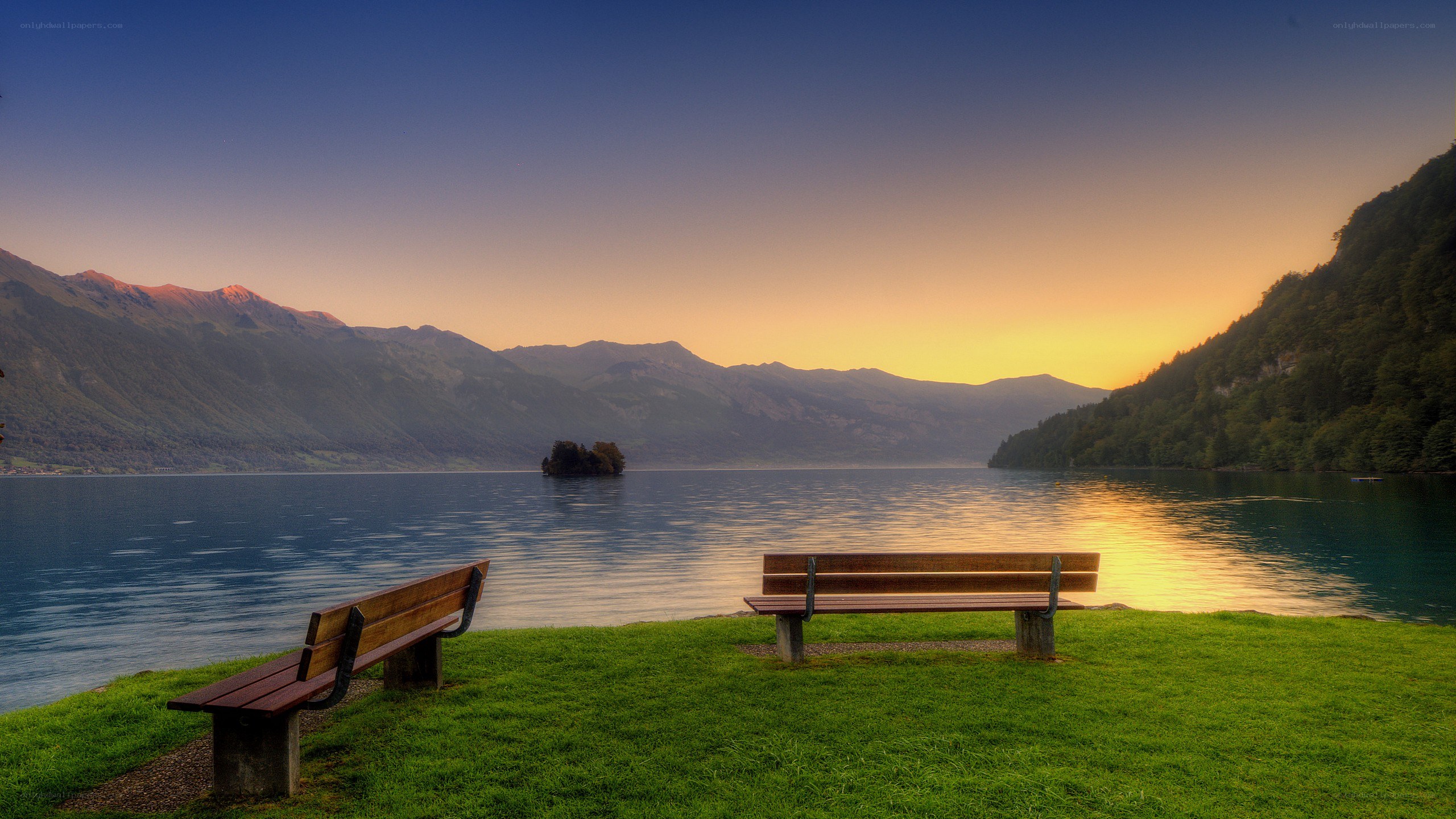 Bench by the lake at sunset