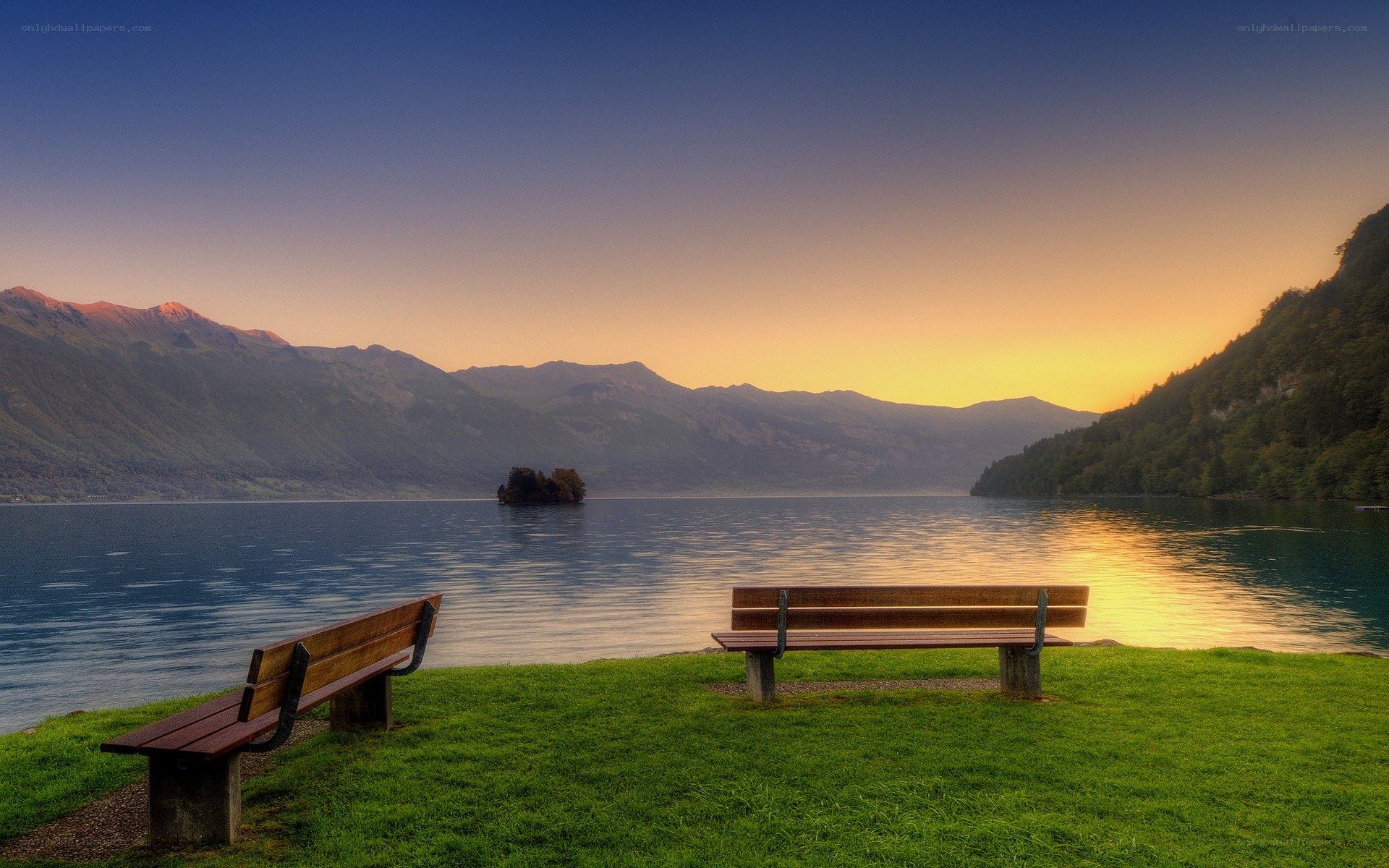 Bench by the lake at sunset