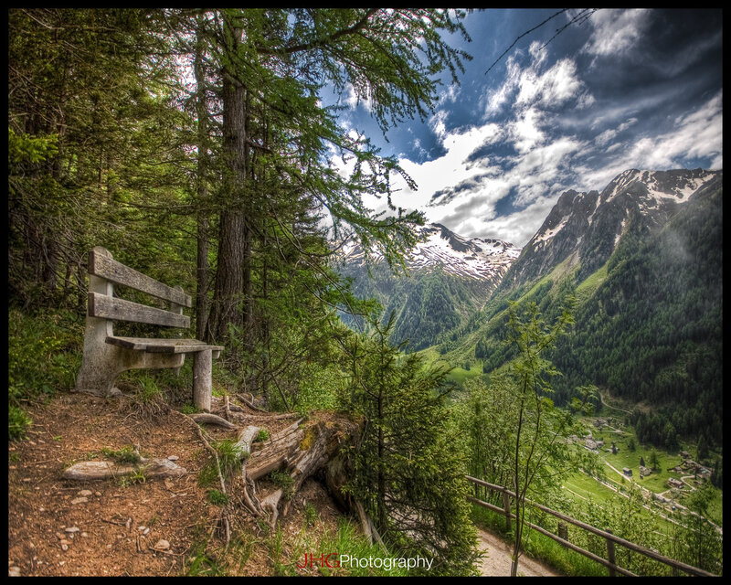 Bench in mountain valley