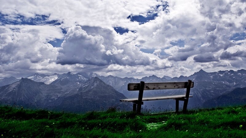 Bench overlooking mountain range