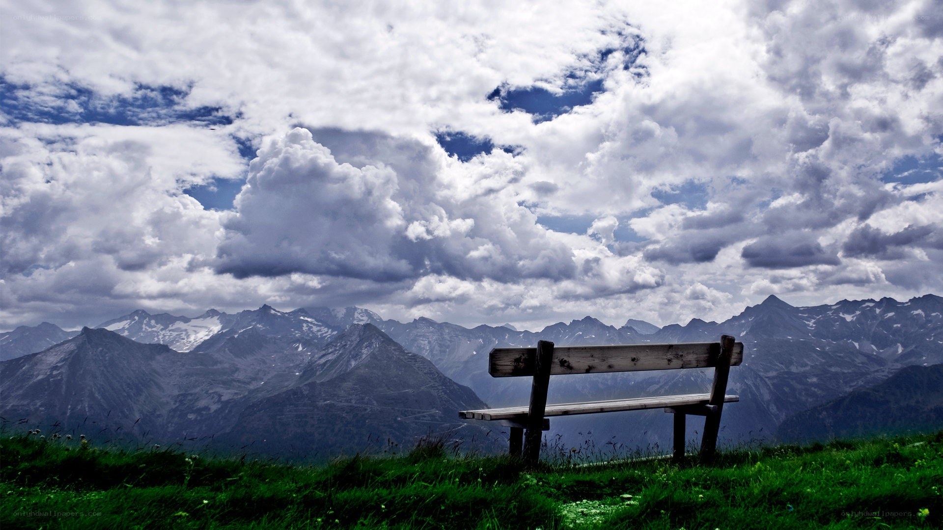 Bench overlooking mountain range