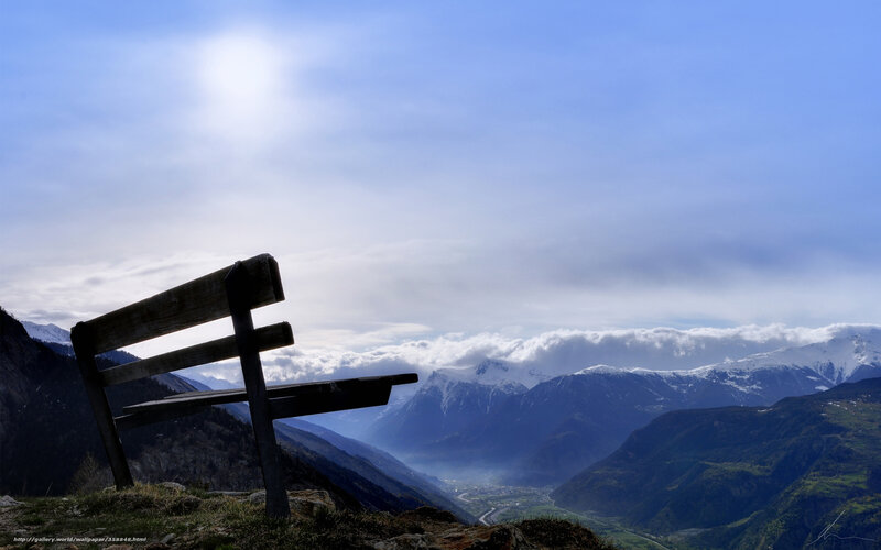 Bench overlooking mountain valley