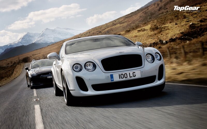 Bentley and Nissan on a mountain road