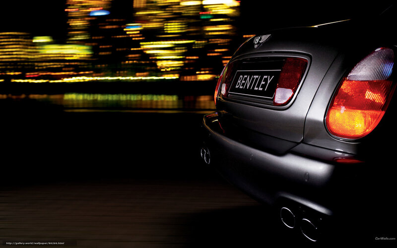 Bentley at night in city