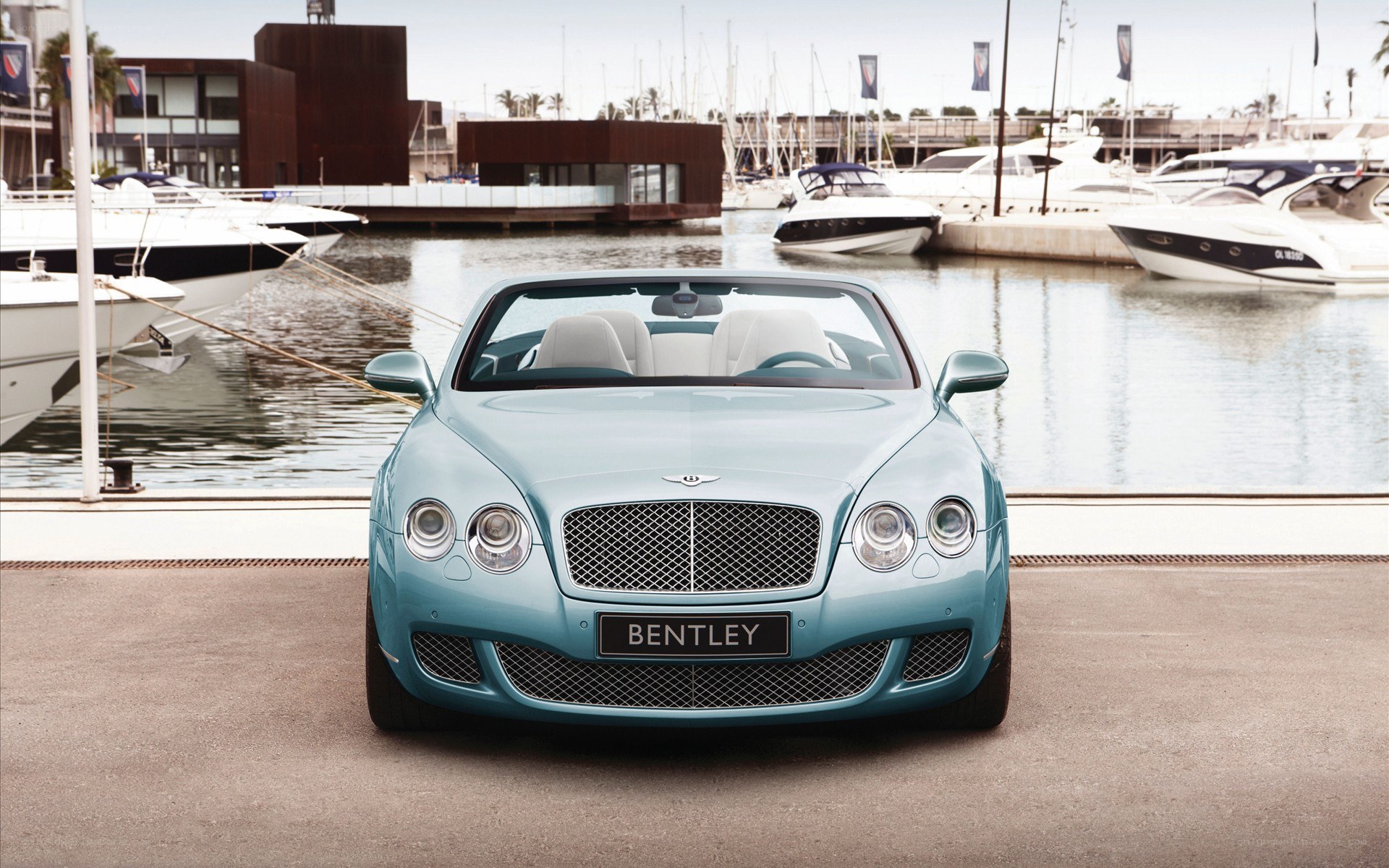 Bentley convertible at marina