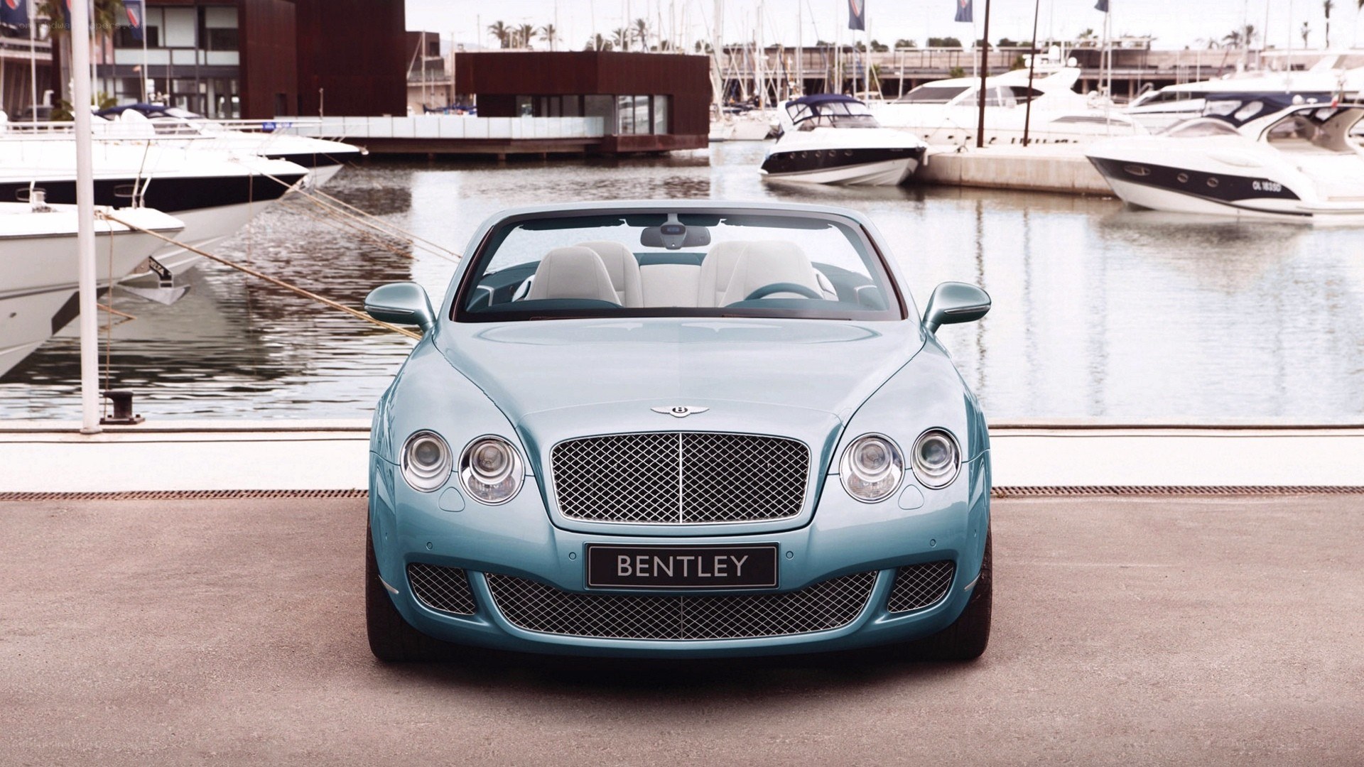 Bentley convertible at marina
