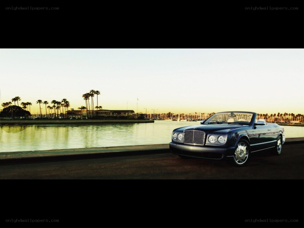 Bentley convertible by the water