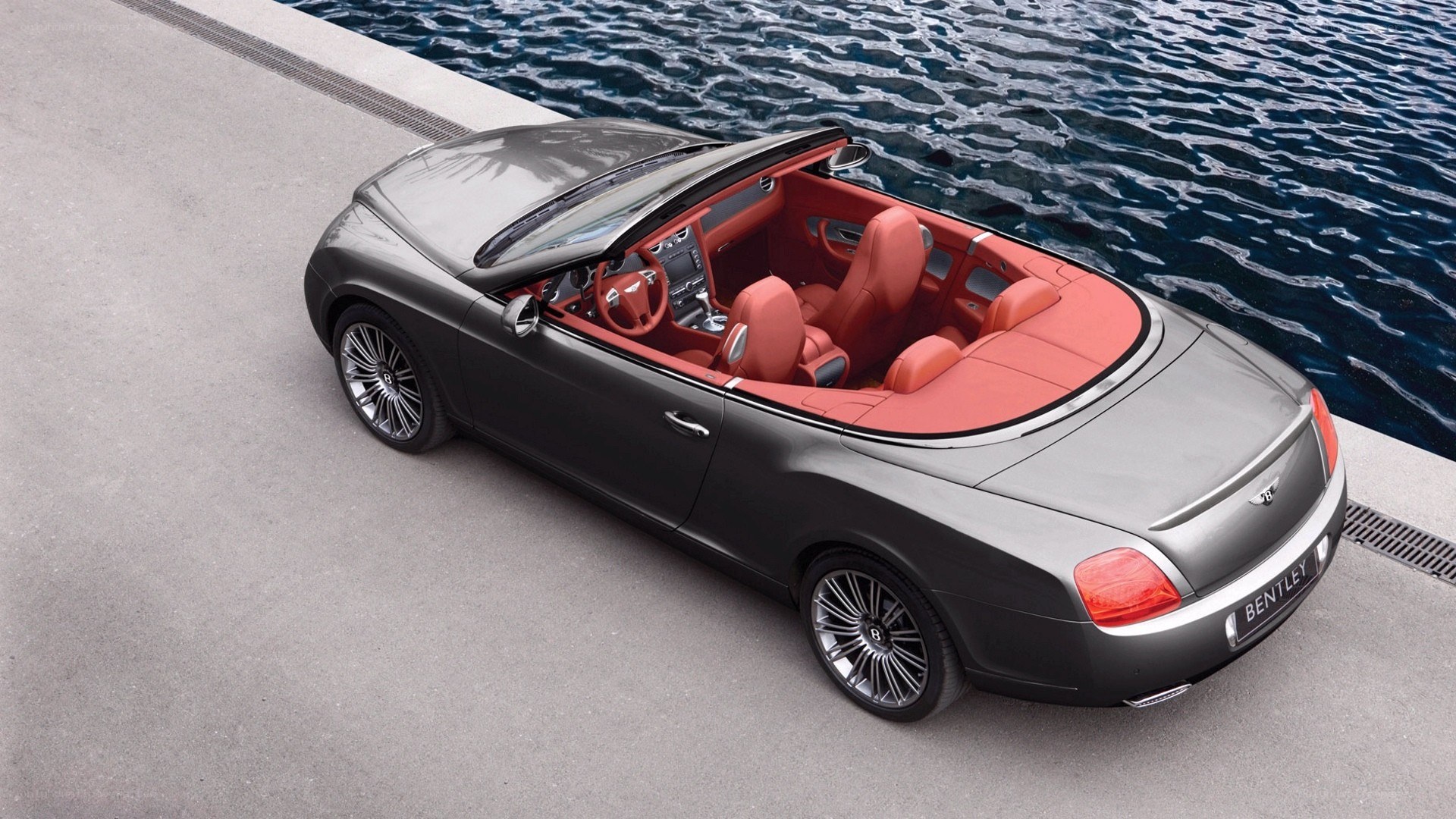 Bentley convertible by the water