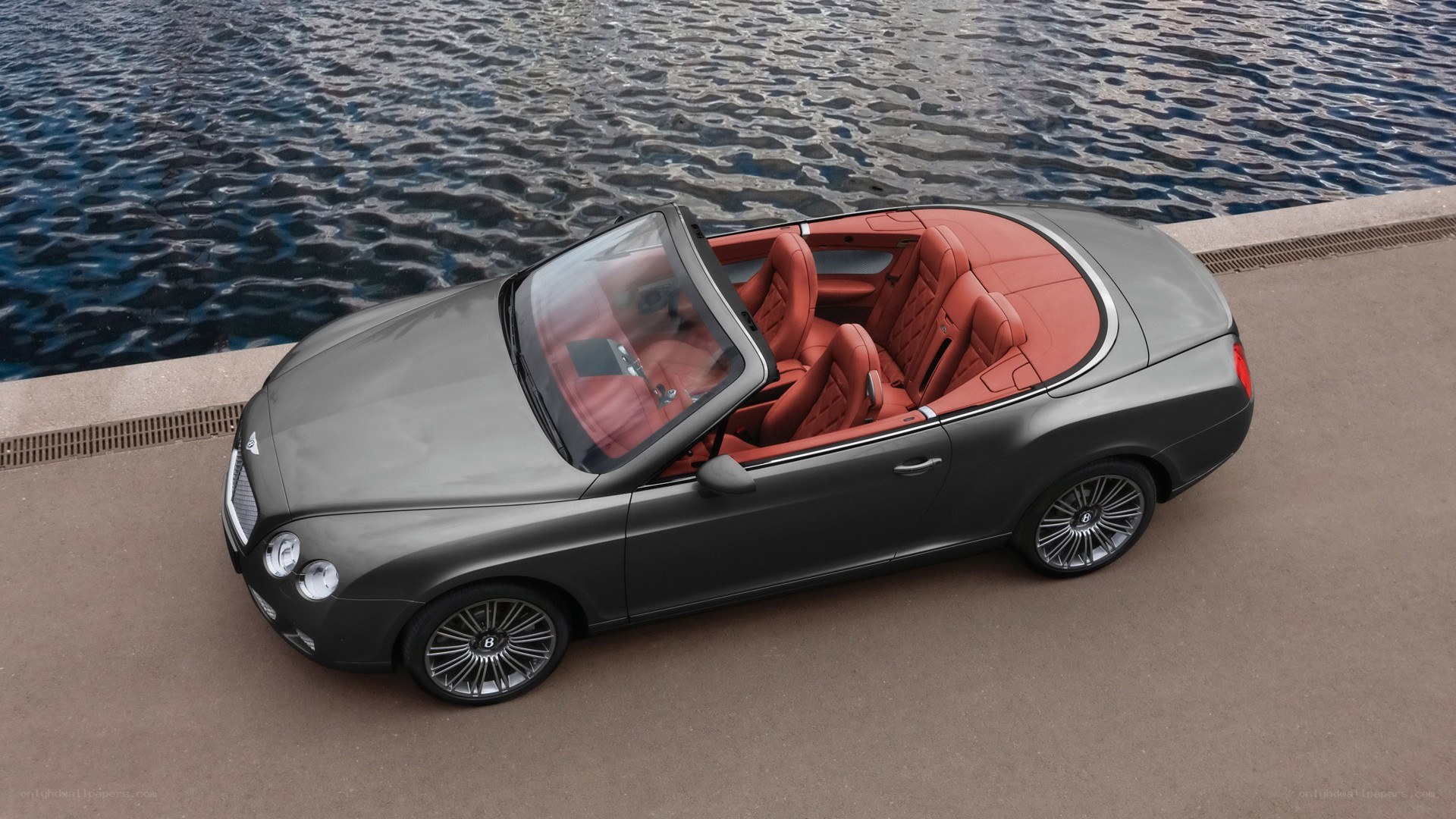 Bentley convertible by water
