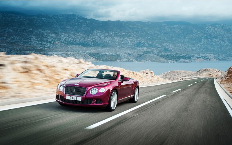 Bentley convertible on coastal road