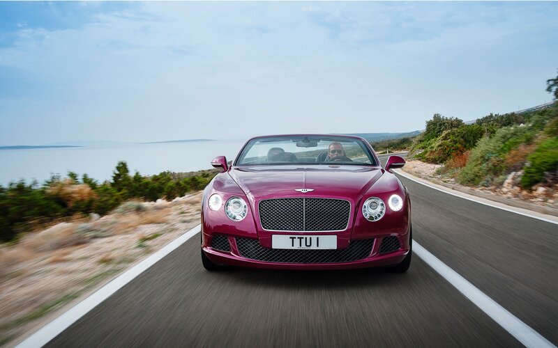Bentley convertible on coastal road