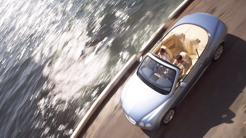 Bentley convertible on coastal road