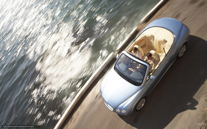 Bentley convertible on coastal road