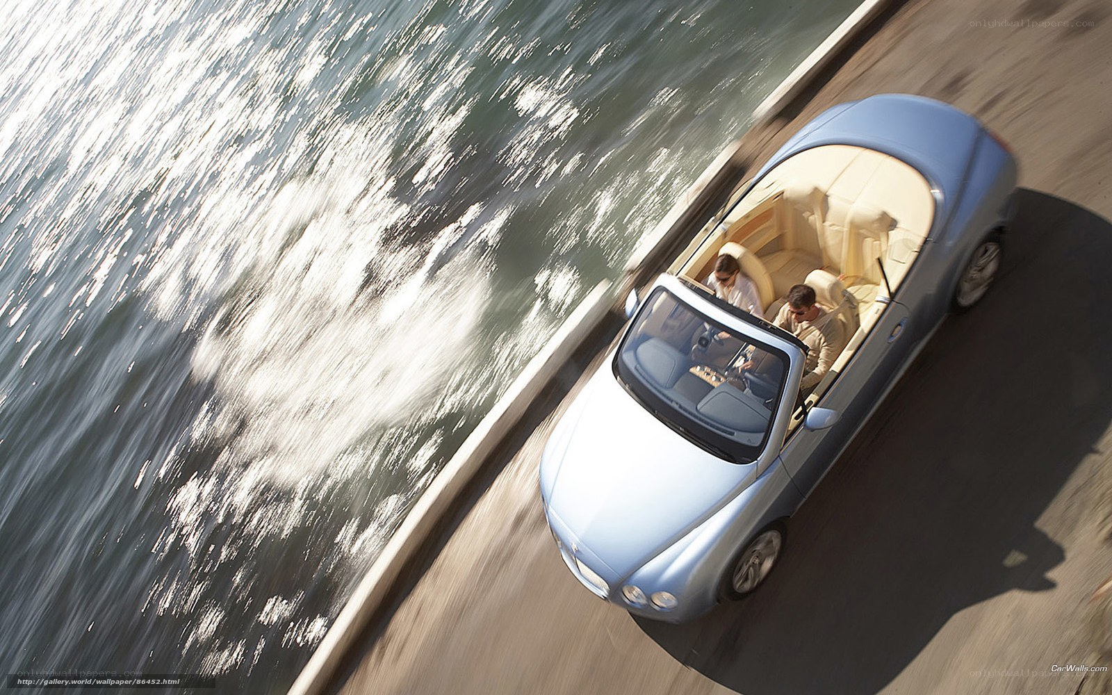 Bentley convertible on coastal road
