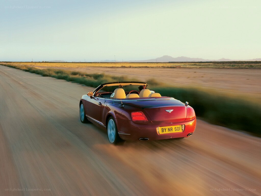 Bentley convertible on desert road