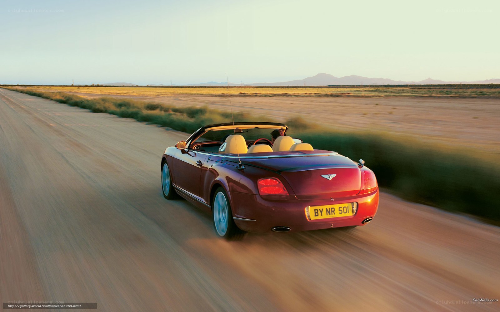 Bentley convertible on desert road
