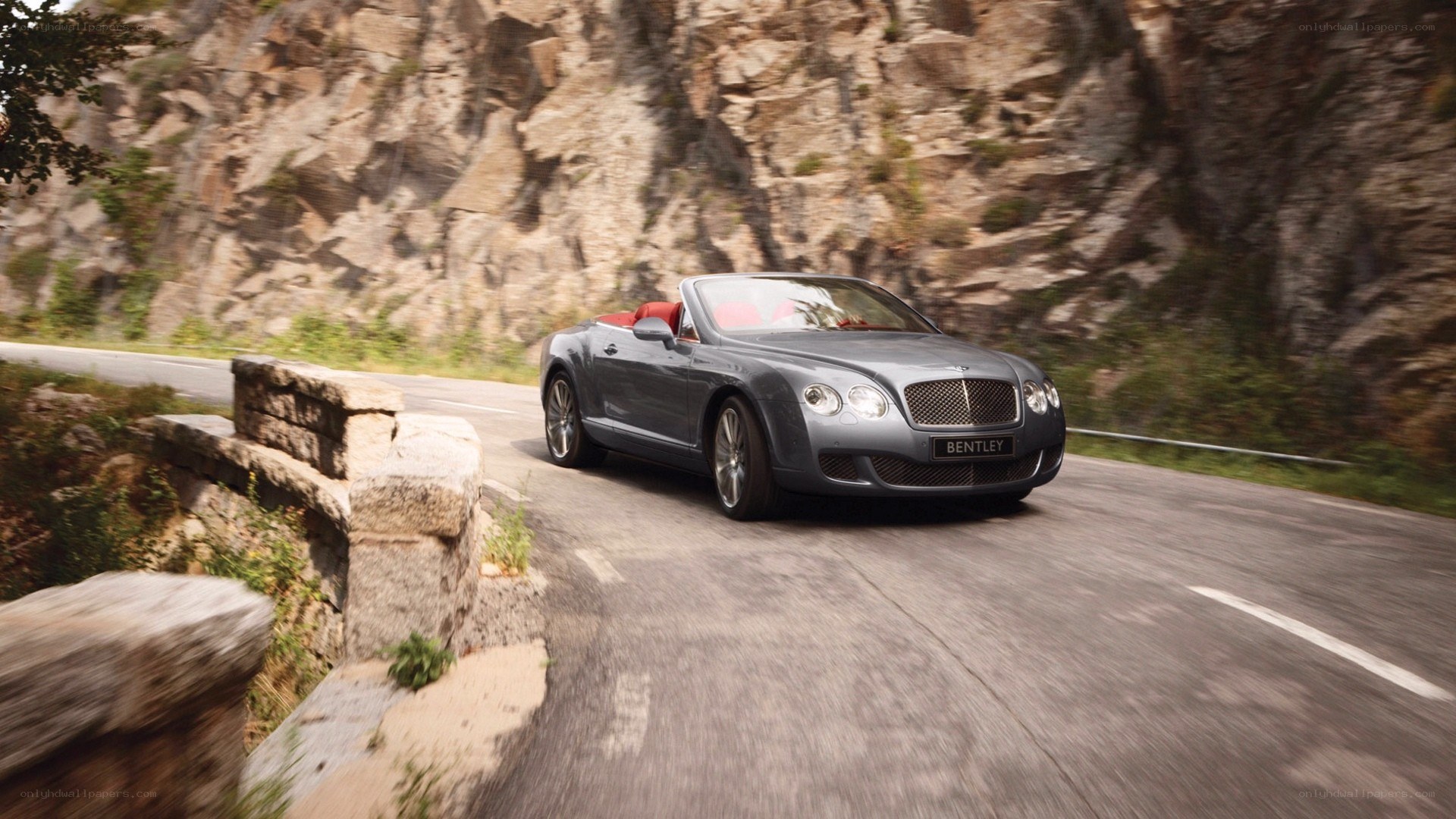 Bentley convertible on mountain road