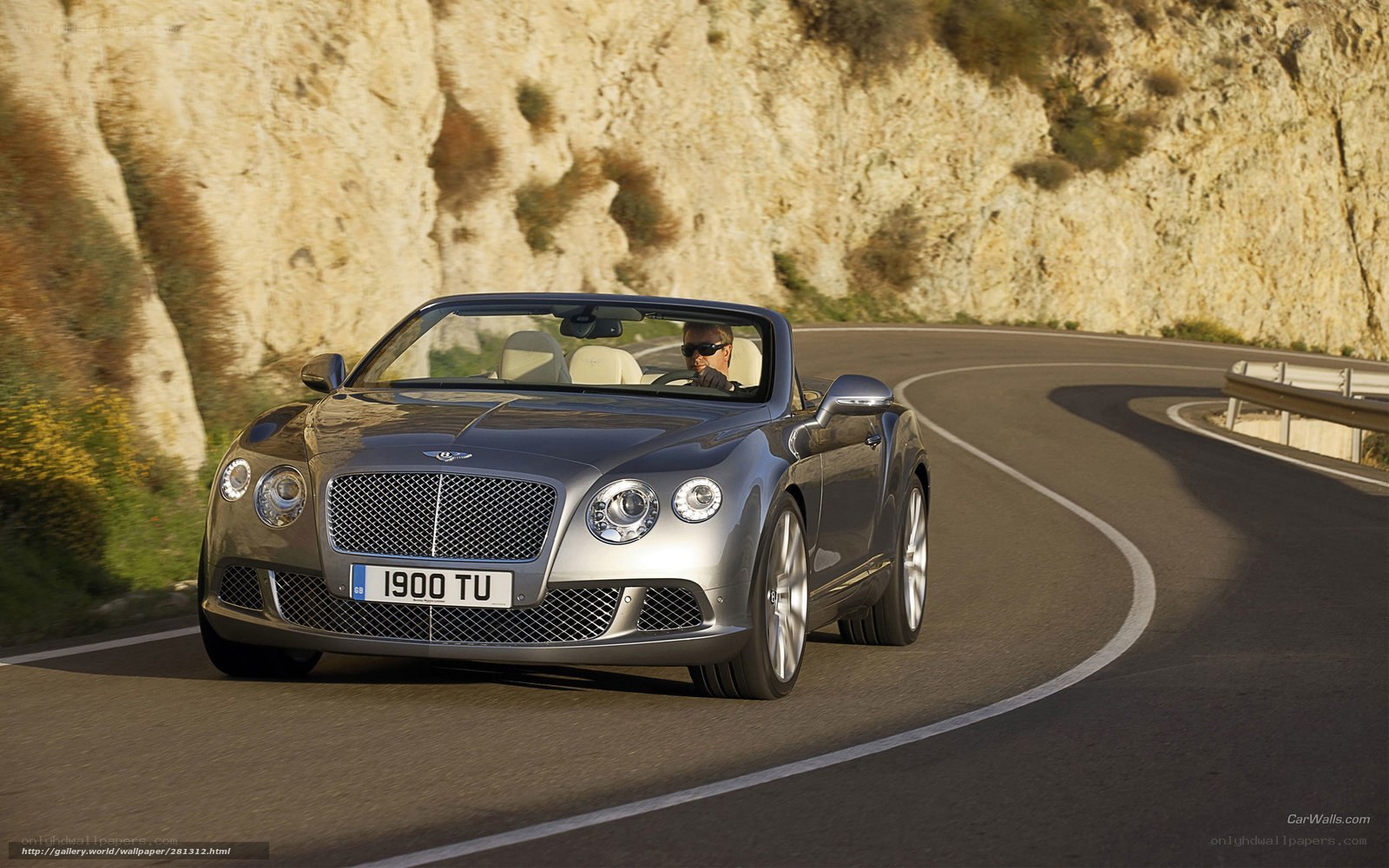 Bentley convertible on winding road