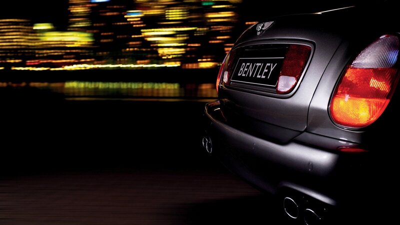 Bentley driving at night