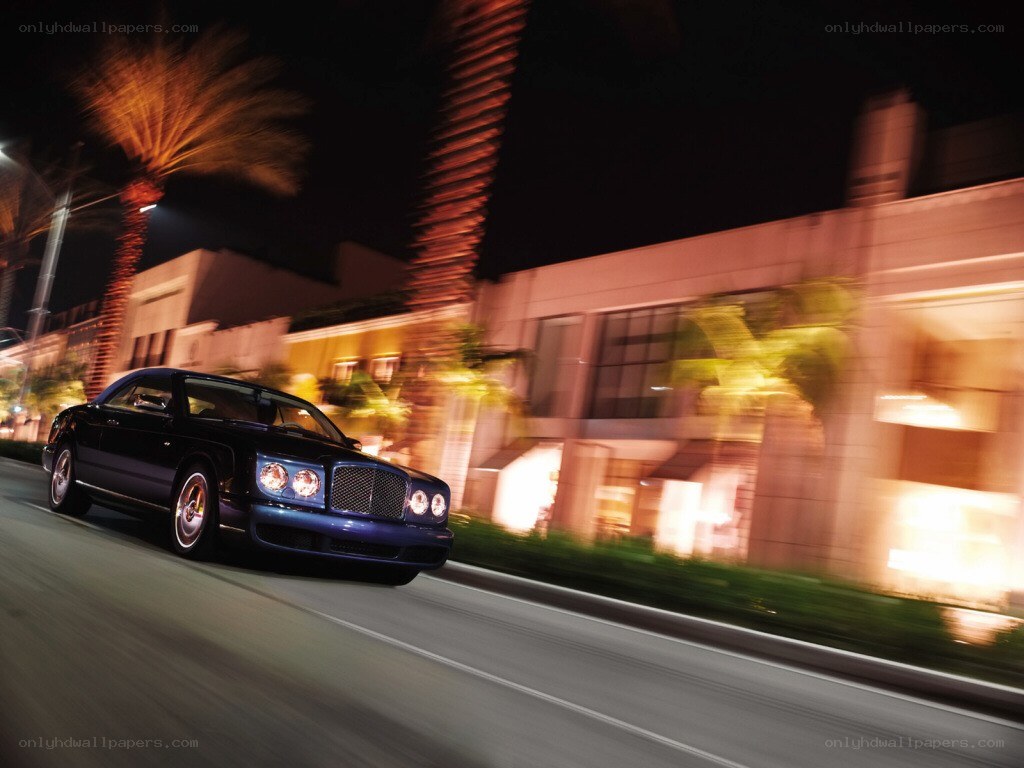 Bentley driving at night