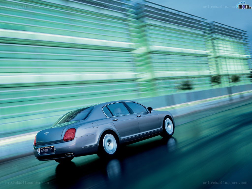 Bentley driving at speed