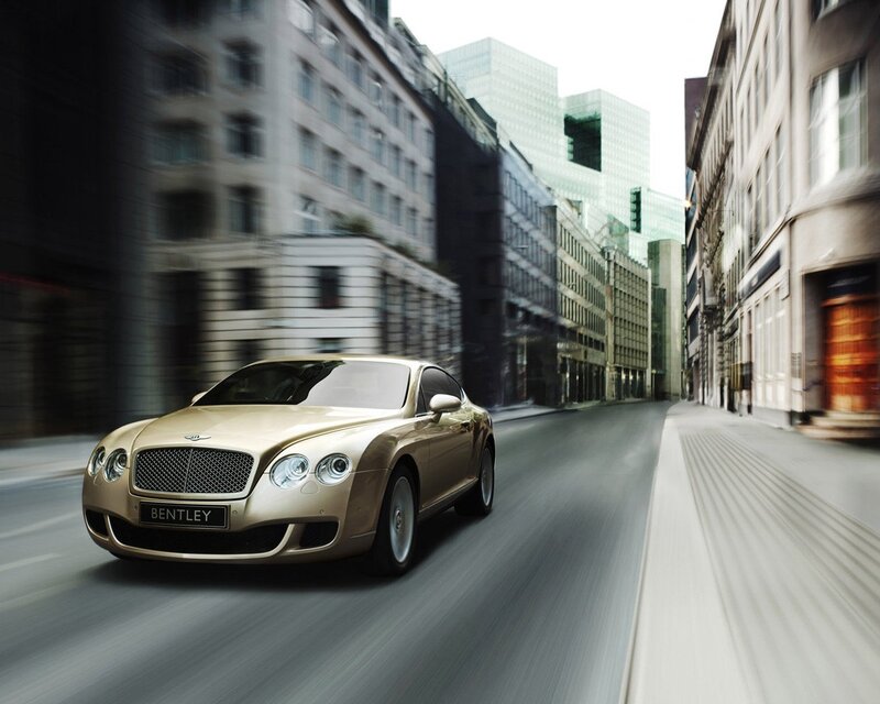 Bentley driving in city